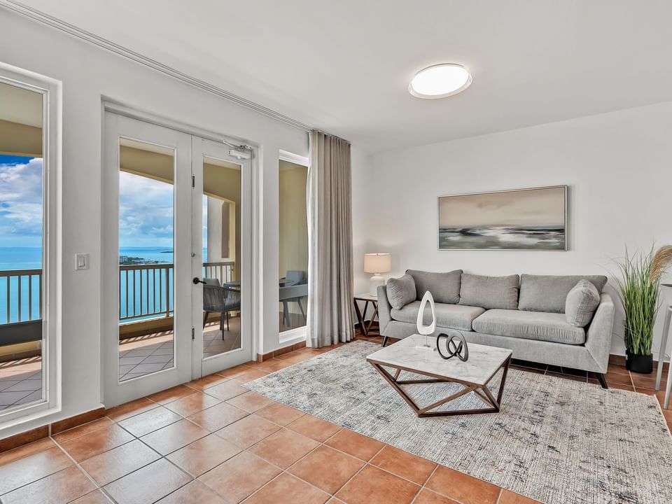 Lounge area in the One Bedroom Ocean View with balcony seating at Las Casitas Village