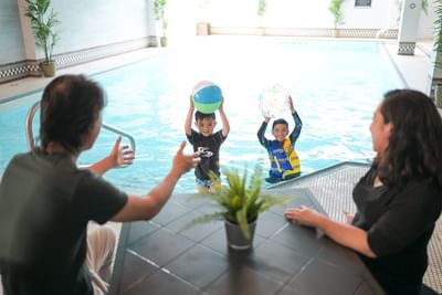 Family enjoying the indoor pool at Rodd Grand Yarmouth, one of the popular hotels in Yarmouth for family stays
