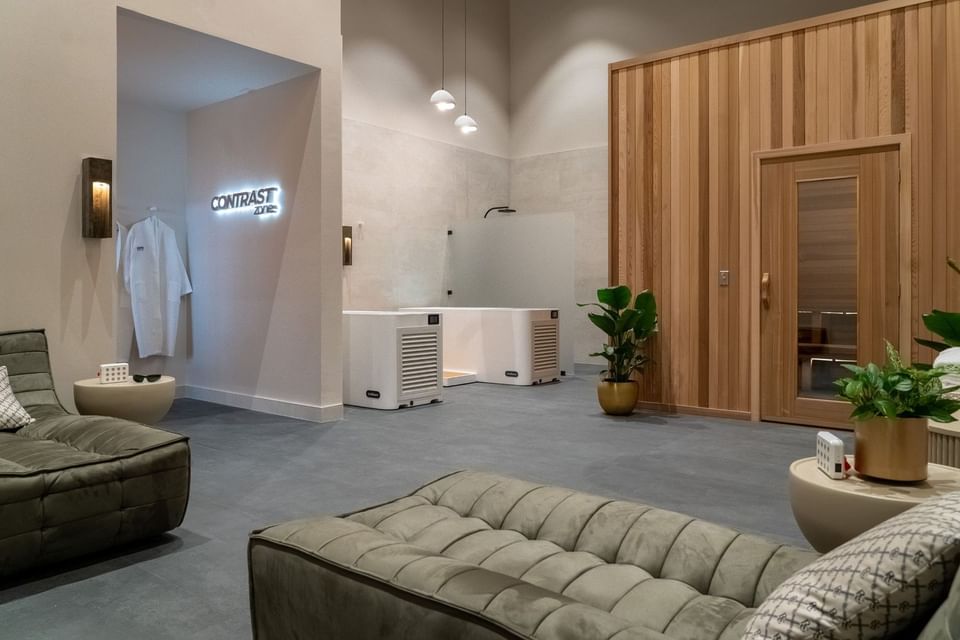 Modern Contrast Zone with cold plunge tubs, sauna, lounge seating, and plants at Hotel X Toronto