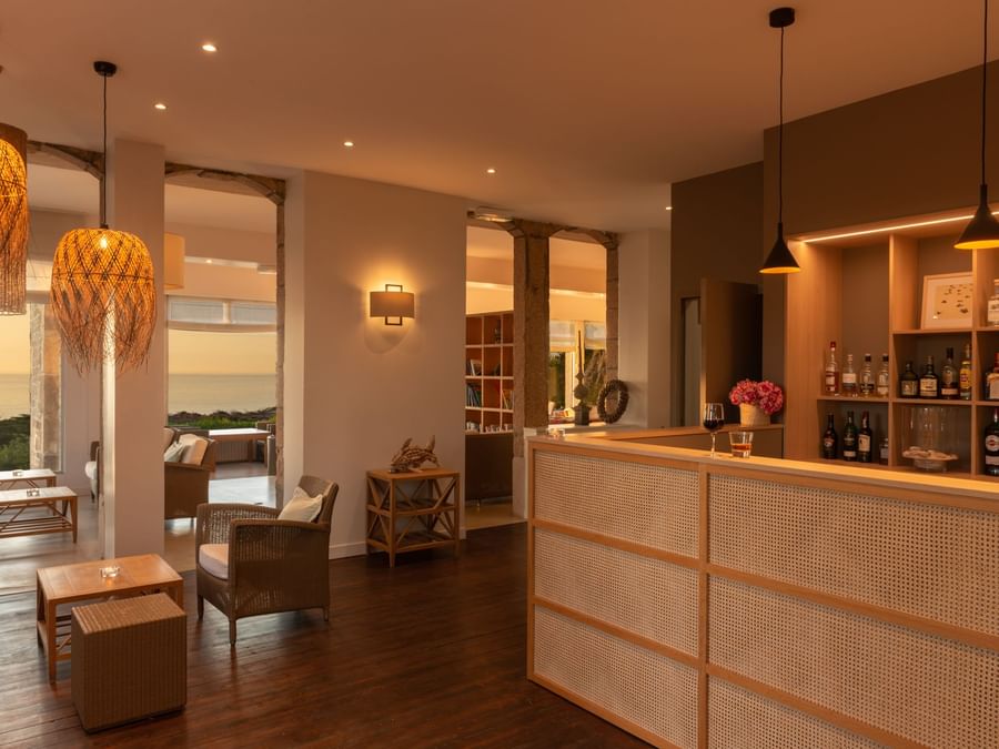 Bar area with lounge space at Hotel les costans