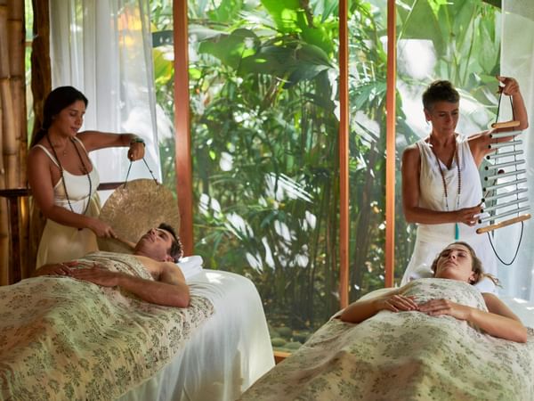 Couple getting massages in the Spa at Cala Luna Boutique Hotel