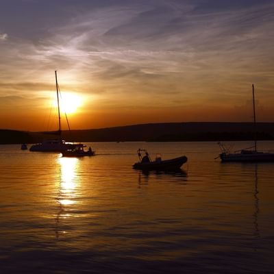 Boats at KRK island for night fishing near Falkensteiner Hotels