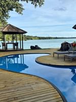 Wooden deck with private pool and ocean view at Efate Pool Villa, Warwick Le Lagon - Vanuatu.