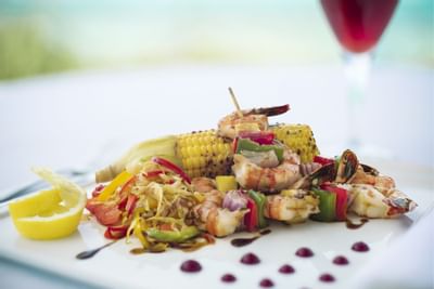 Dish with corn and prawns served in a restaurant at Windsong Resort On The Reef