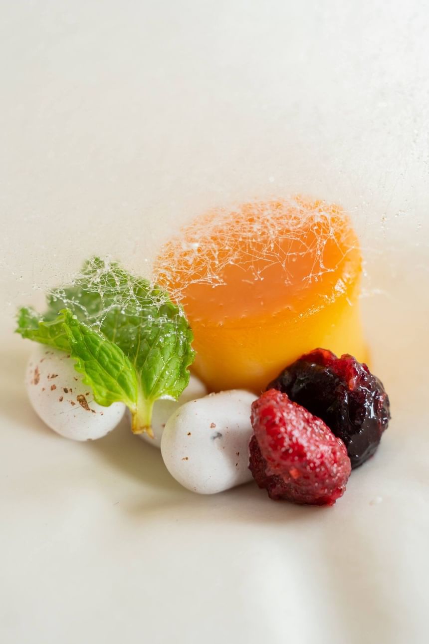 Close-up of Peach Melba dessert served at Club Hemingway