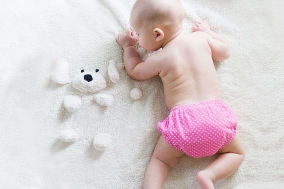 Baby on a fluffy white blanket at Park Hotel Hong Kong