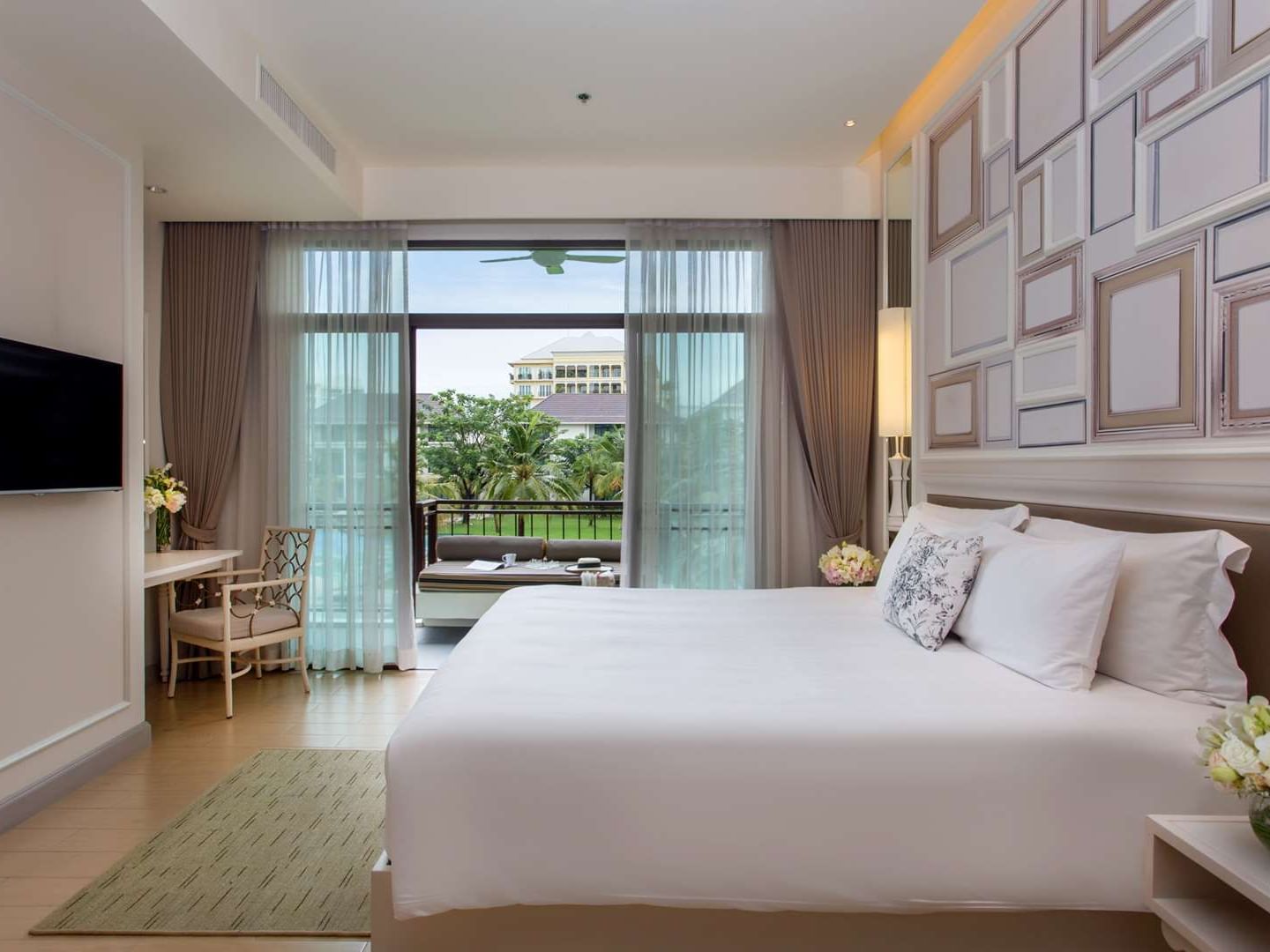 King bed in Deluxe Garden room at U Hotels and Resorts