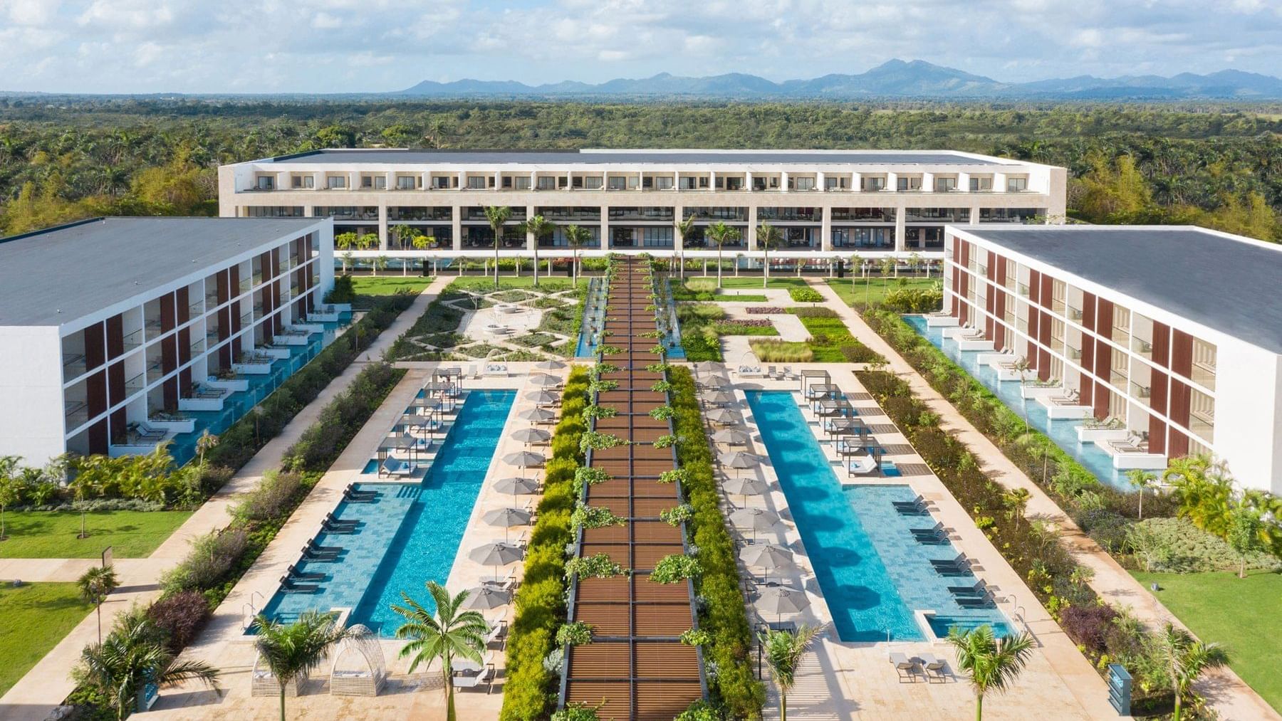 Aerial view of the outdoor pools at Live Aqua Resorts
