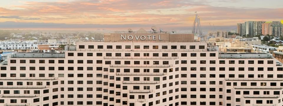 Hotel exterior at Novotel Sydney Darling Harbour featuring contemporary design, street-level access, and proximity to Sydney CBD attractions