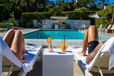 Couple Dining Poolside 
