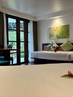 Elegant Garden View Rooms with tropical decor and serene garden access at Warwick Fiji Korolevu.