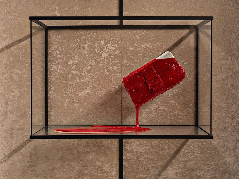 A piece of art in a glass box at Fendi Private Suites