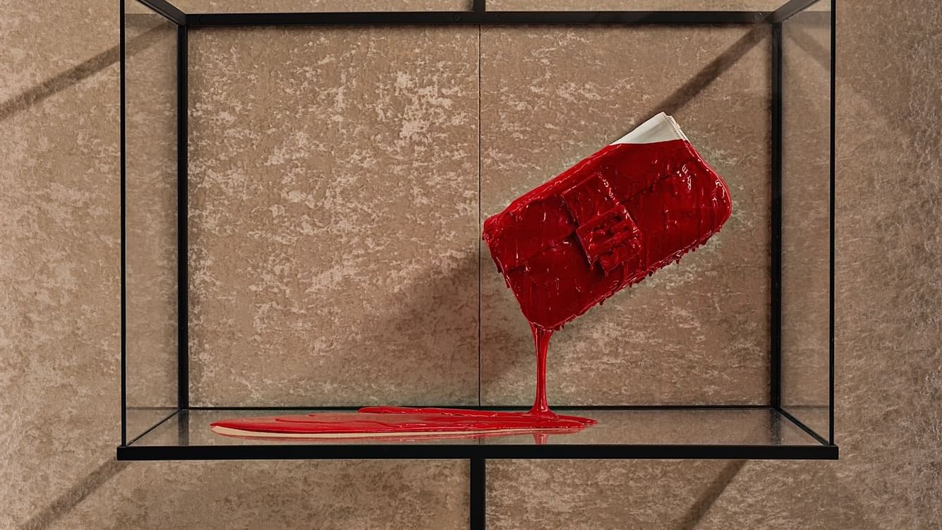 A piece of art in a glass box at Fendi Private Suites