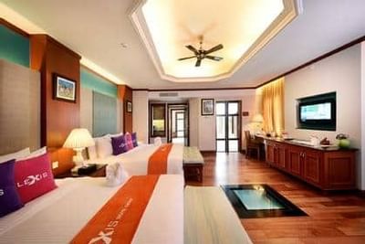 Executive Pool Villa featuring modern décor, ceiling fan, and work desk - Grand Lexis Port Dickson