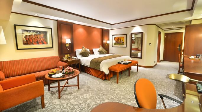 Interior of a room with king bed at Kampala Serena Hotel