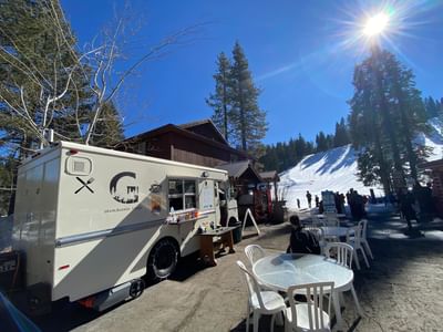 Food truck with outdoor dining tables at Granlibakken Tahoe