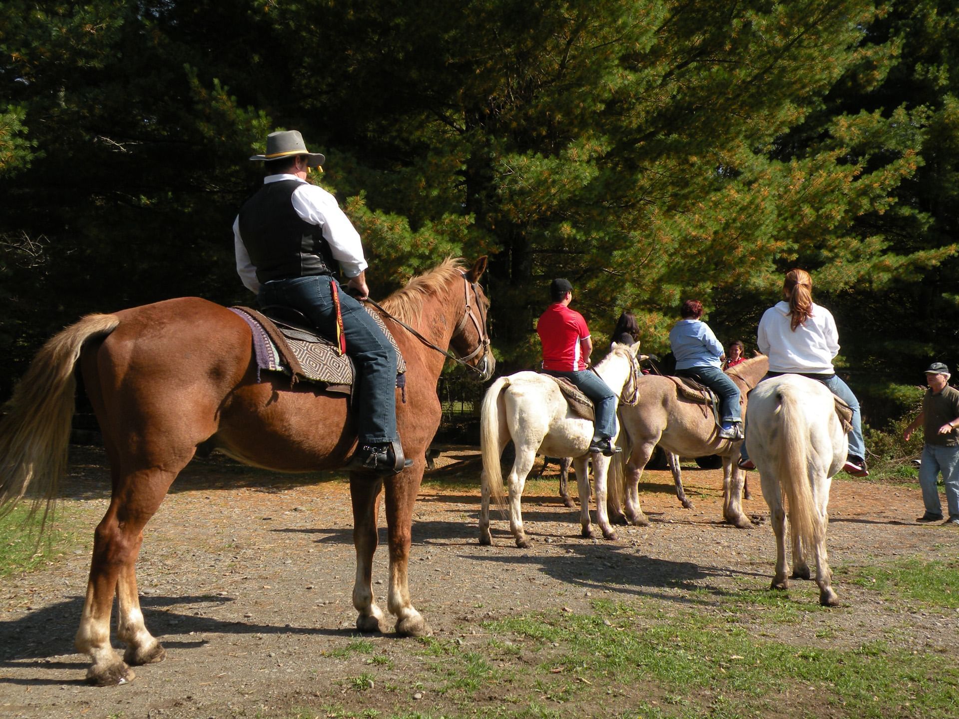 People riding horses near Honor’s Haven Retreat Retreat