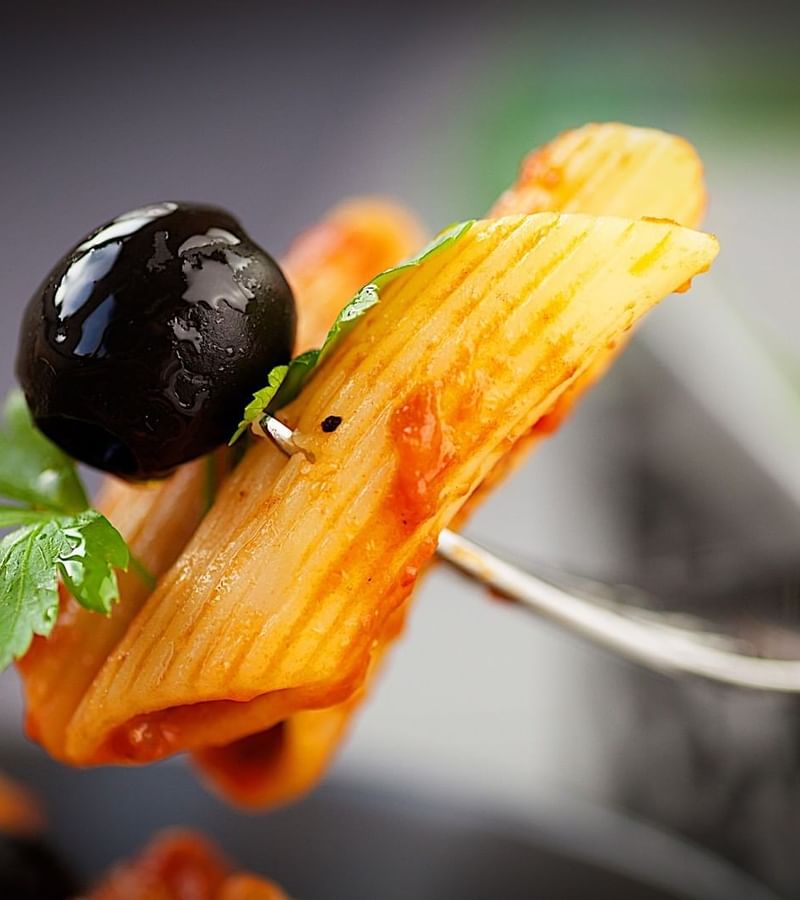 Close-up of pasta in a fork at Mundo Imperial