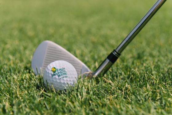 Close up on a golf ball & a golf club at Eagle Mountain House 