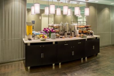 Close-up of a continental breakfast buffet at Kinzie Hotel