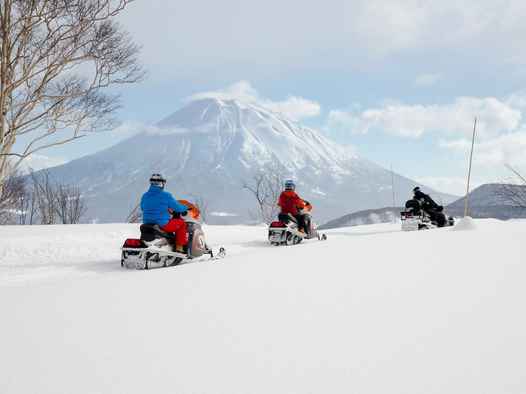 Snow Mobiling in the snow near Chatrium Niseko Japan