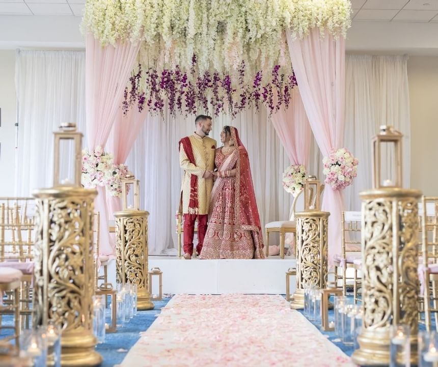 Traditional Indian-dressed wedding couple, Ocean Place Resort