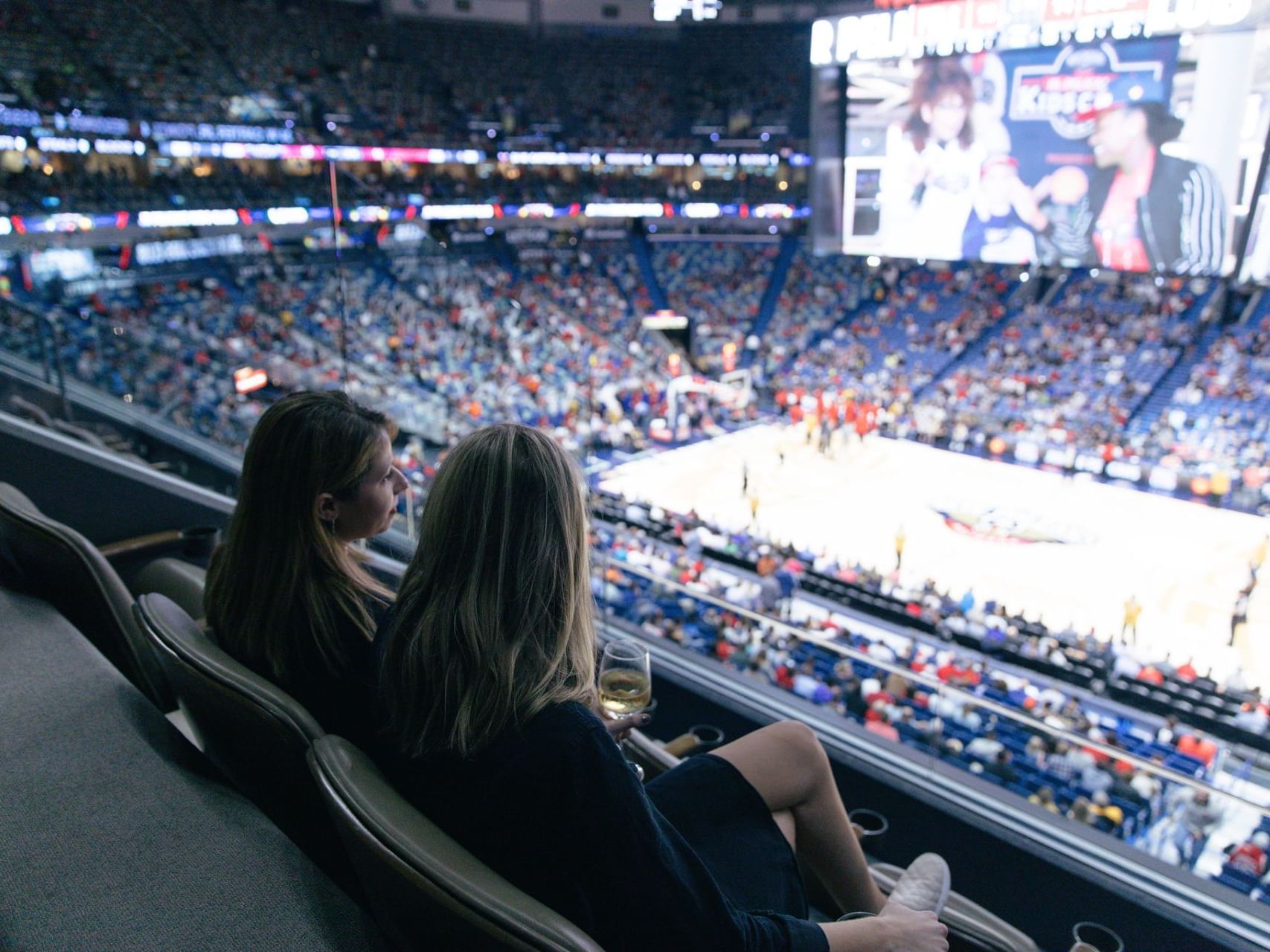 Crowd gathered in Smoothie King Center near Audubon Cottages