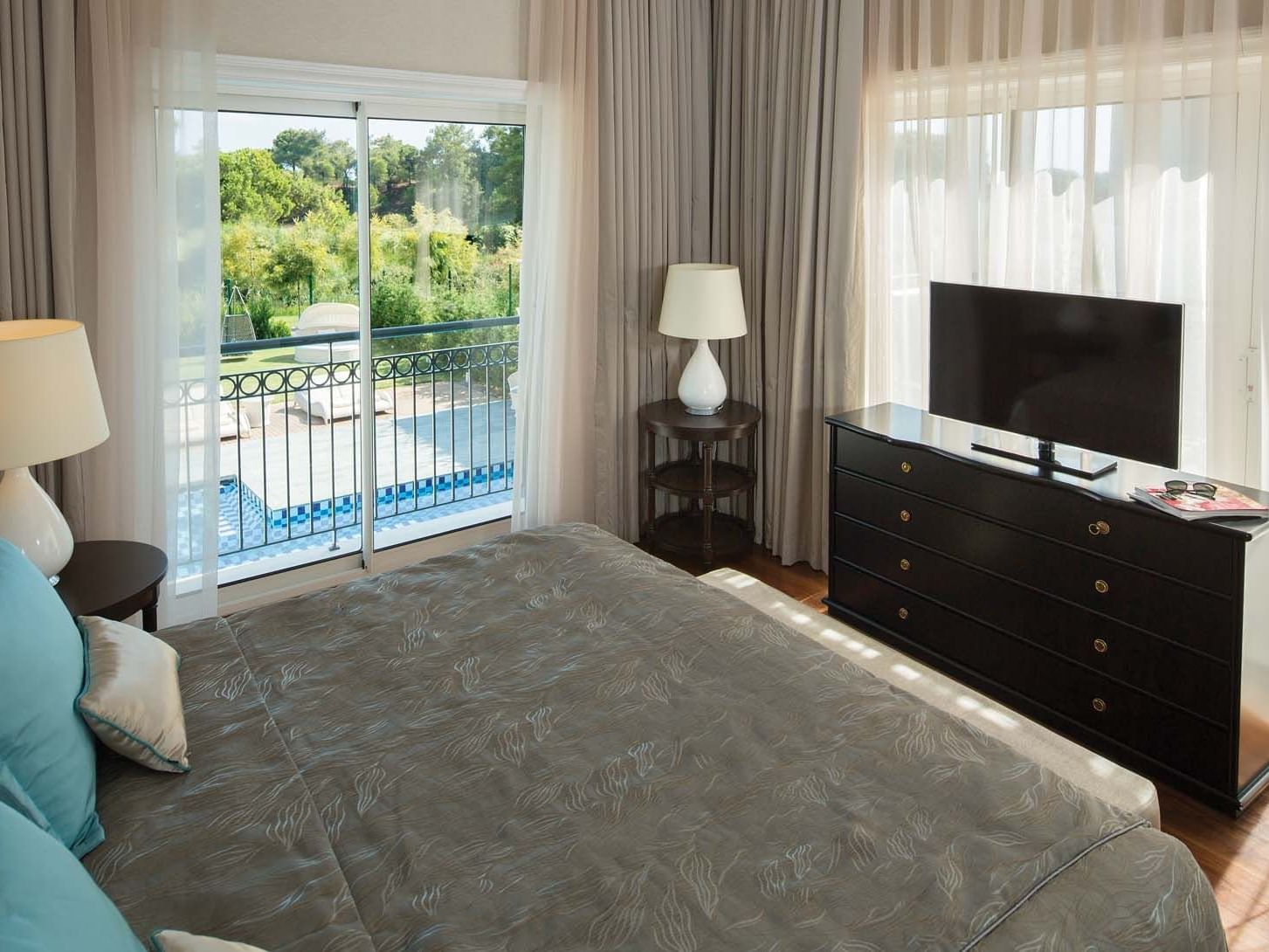 TV facing by the bed in Superior Villa at Titanic Deluxe Golf Belek