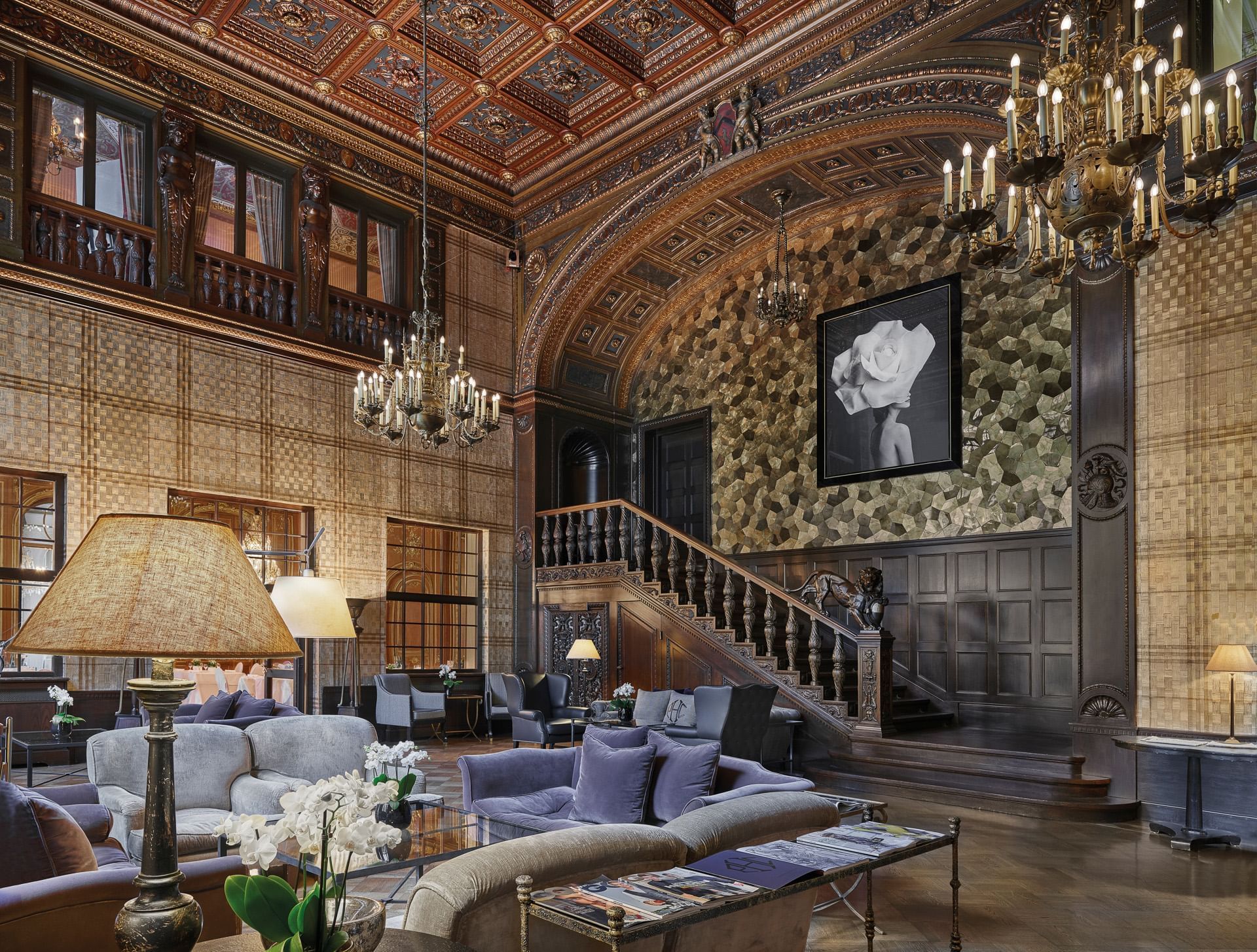 Lobby living area with stairs at Patrick Hellman Schlosshotel