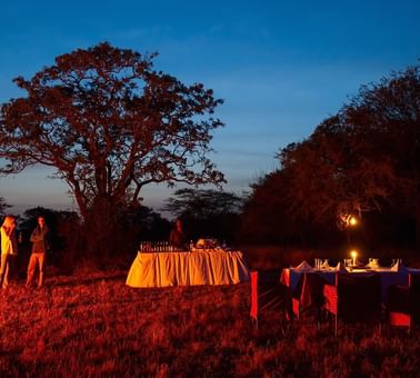 An outdoor dining area at Kirawira Serena Camp
