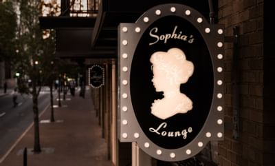 outside sign for sophias lounge