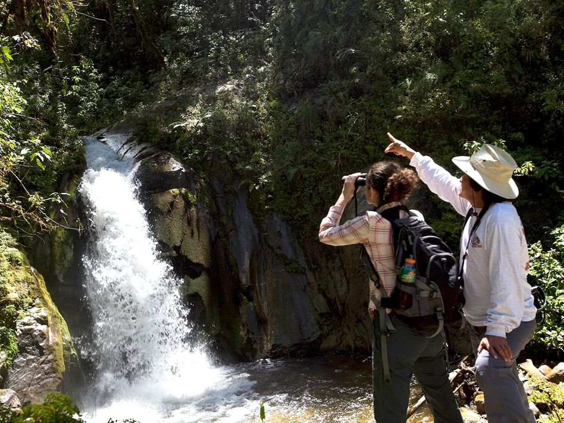 Tourists exploring Mandor Valley near Hotel Sumaq 