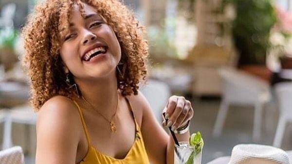 Women smiling with cocktail near Hotel El Convento