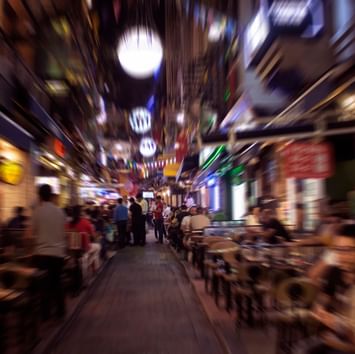 Blurred image of a city alley featuring Istanbul Nights near Titanic Port Bakirkoy