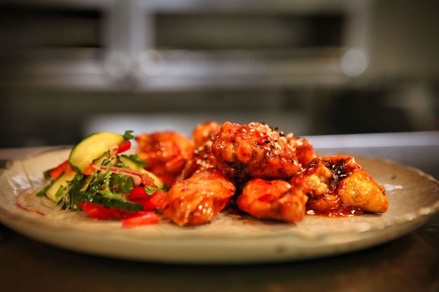 Honey glazed chicken served in Trade Restaurant & Lounge at Hotel Republic San Diego