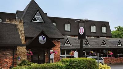 Exterior view of the Village Hotel Manchester by the street