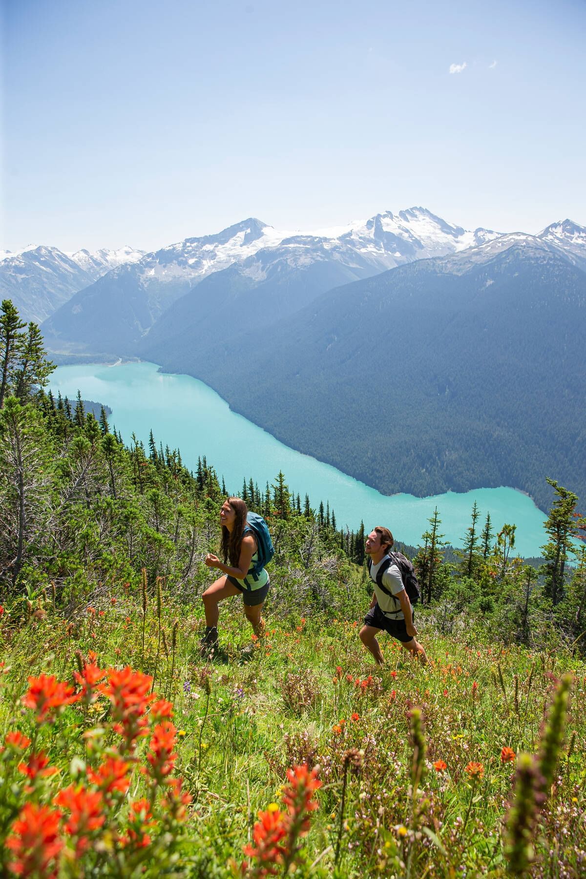 Couple walking on Whistler Mountain trail near Blackcomb Springs Suites