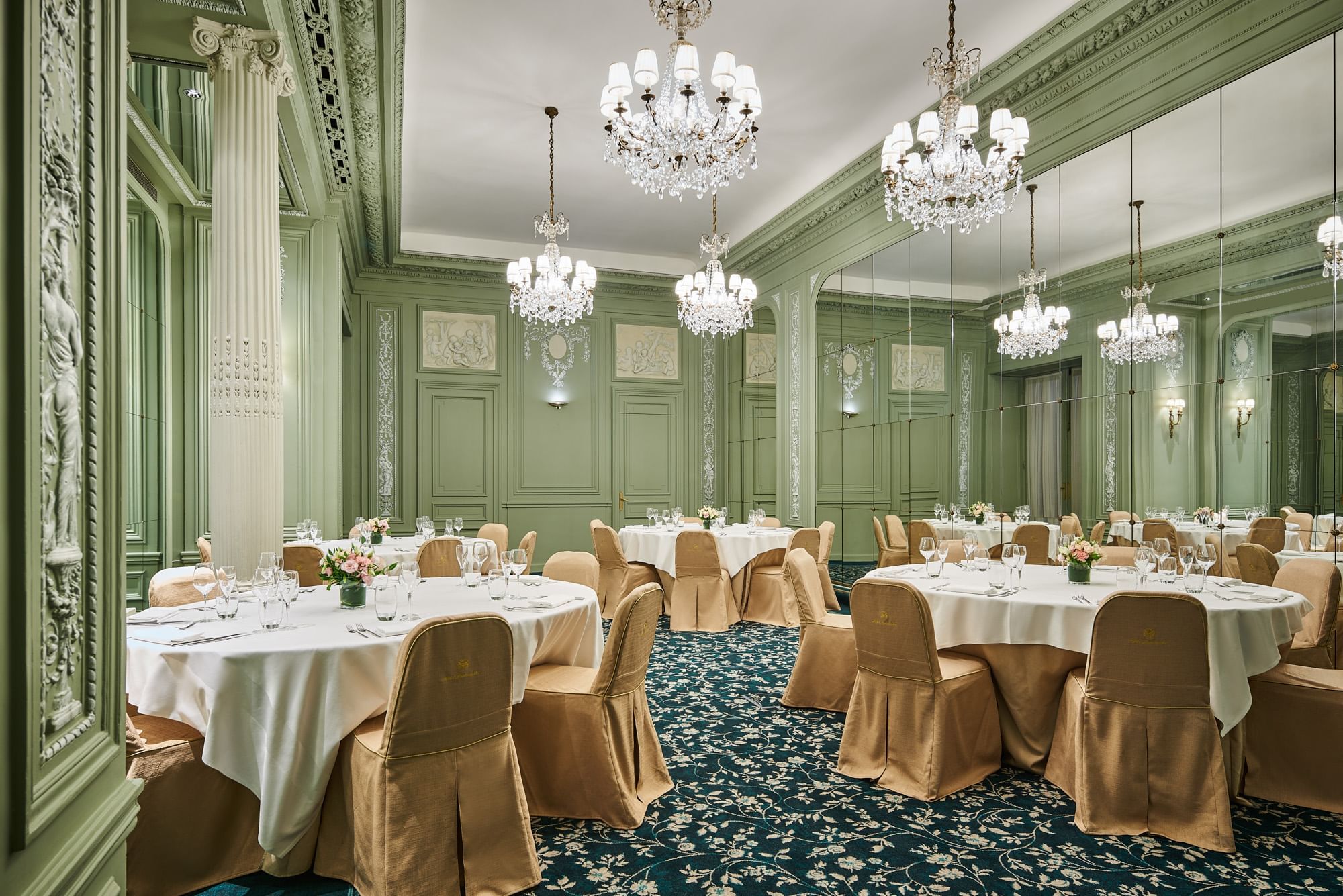 Elegant interior with banquet table set up with chandeliers in Récamier meeting room at Hôtel Westminster - Paris
