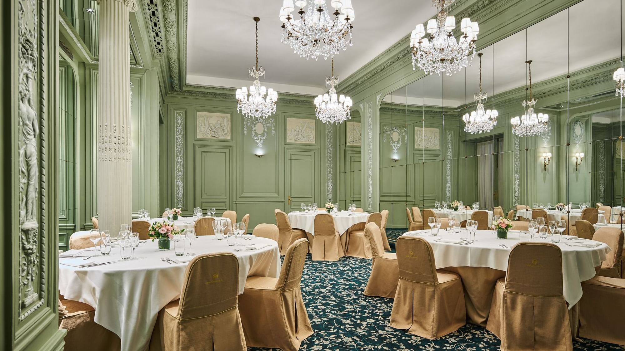 Elegant interior with banquet table set up with chandeliers in Récamier meeting room at Hôtel Westminster - Paris