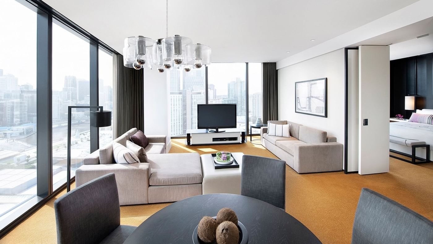 Interior of Func Room Loft with a cozy lounge area overlooking the city at Crown Hotels
