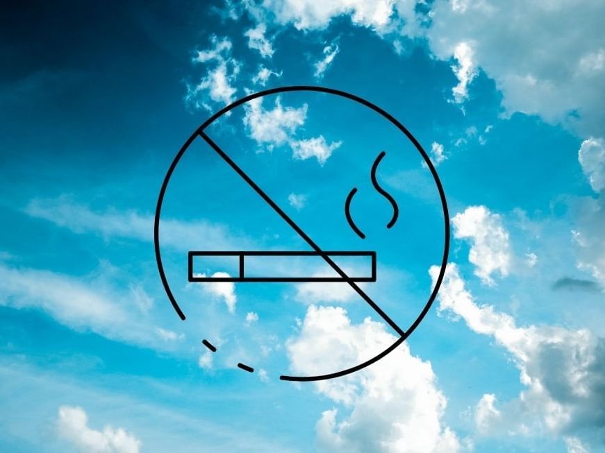 No smoking symbol on sky background at Brady Hotels