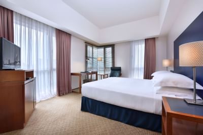 Bedroom arrangement in a room at Hotel Capitol Kuala Lumpur