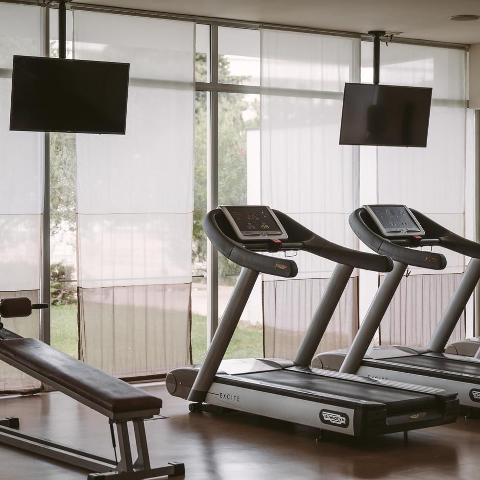Treadmills in the gym at Falkensteiner Hotels