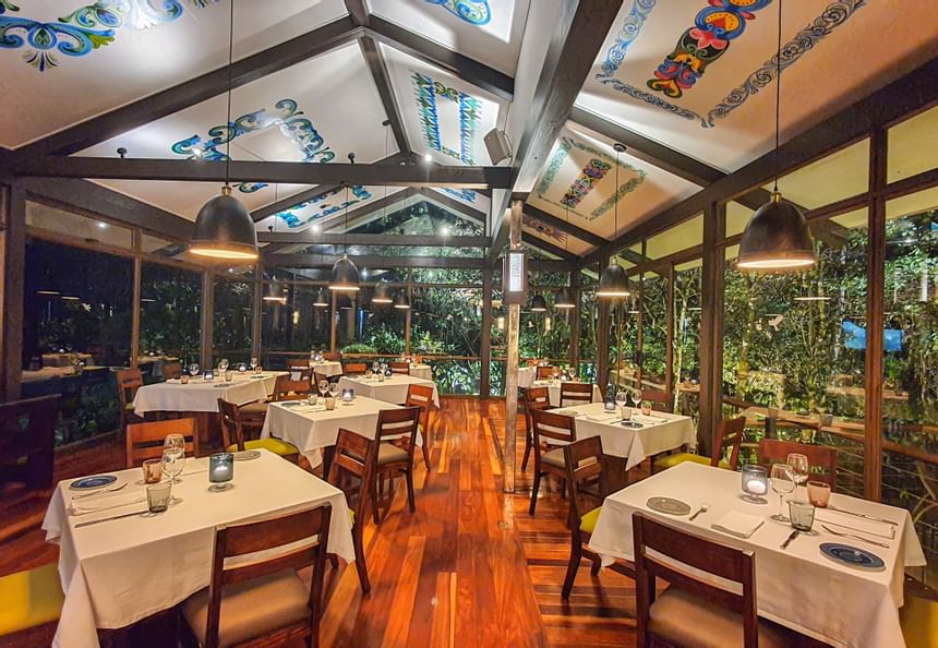 restaurant dining room with floor to celing windows