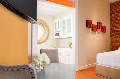 Bedroom interior of Double Queen Brownstone at Retro Suites