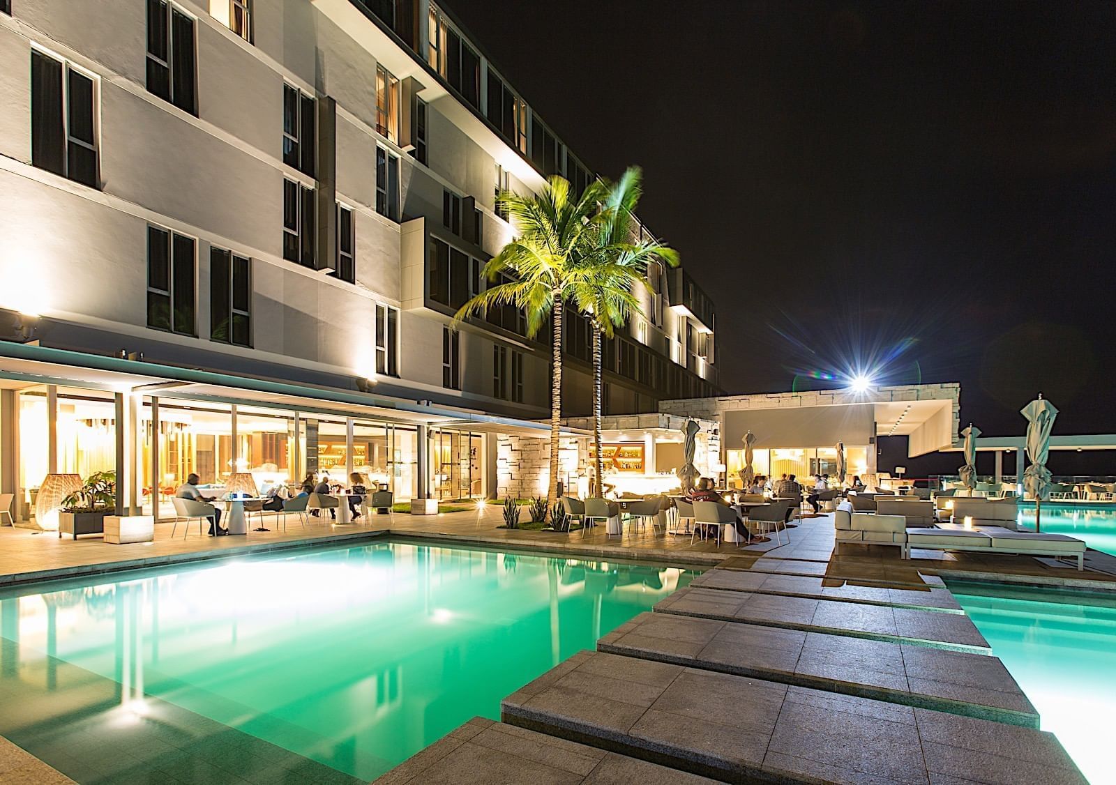 Pool at Noom Hotel Conakry by night