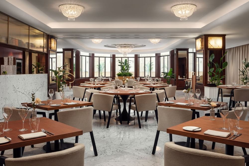 Dining tables arranged in Alcron Restaurant at Almanac X Alcron Prague, Fine Dining Prague