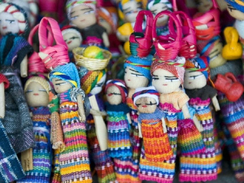 Close-up of crafted Worry Dolls near Porta Hotel del Lago