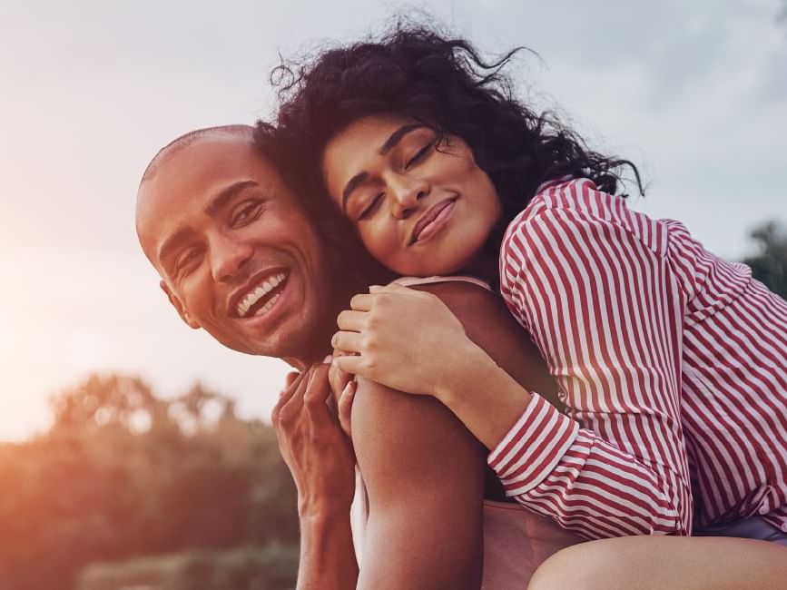 couple enjoying hotel summer promotions