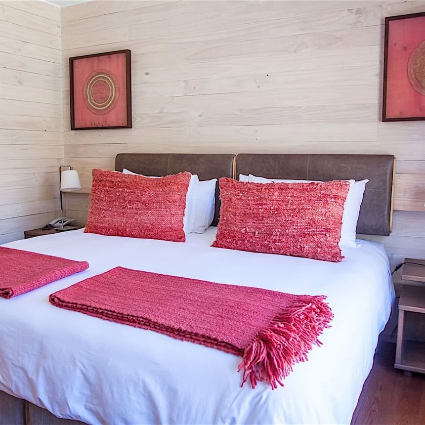 Habitación Deluxe con cama king size en el Hotel NOI Puma Lodge